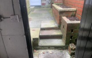 small sandstone patio garden with steps lancashire 01
