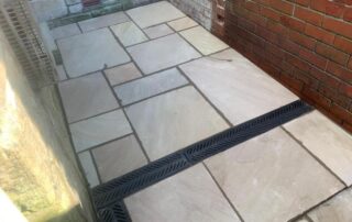small sandstone patio garden with steps lancashire 05