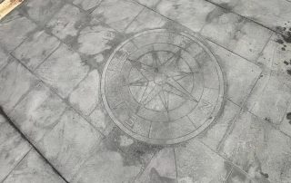 large patio imprinted concrete whitefield compass