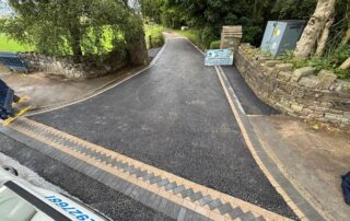 large tarmac driveway with paved brick edging kenyon clough helmshore 01